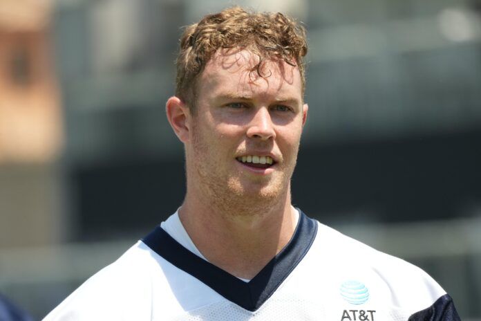 Dallas Cowboys TE Luke Schoonmaker looking on during training camp.