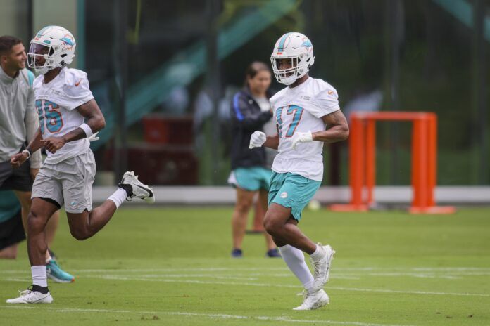 Miami Dolphins WR Jaylen Waddle (17) working out during training camp.