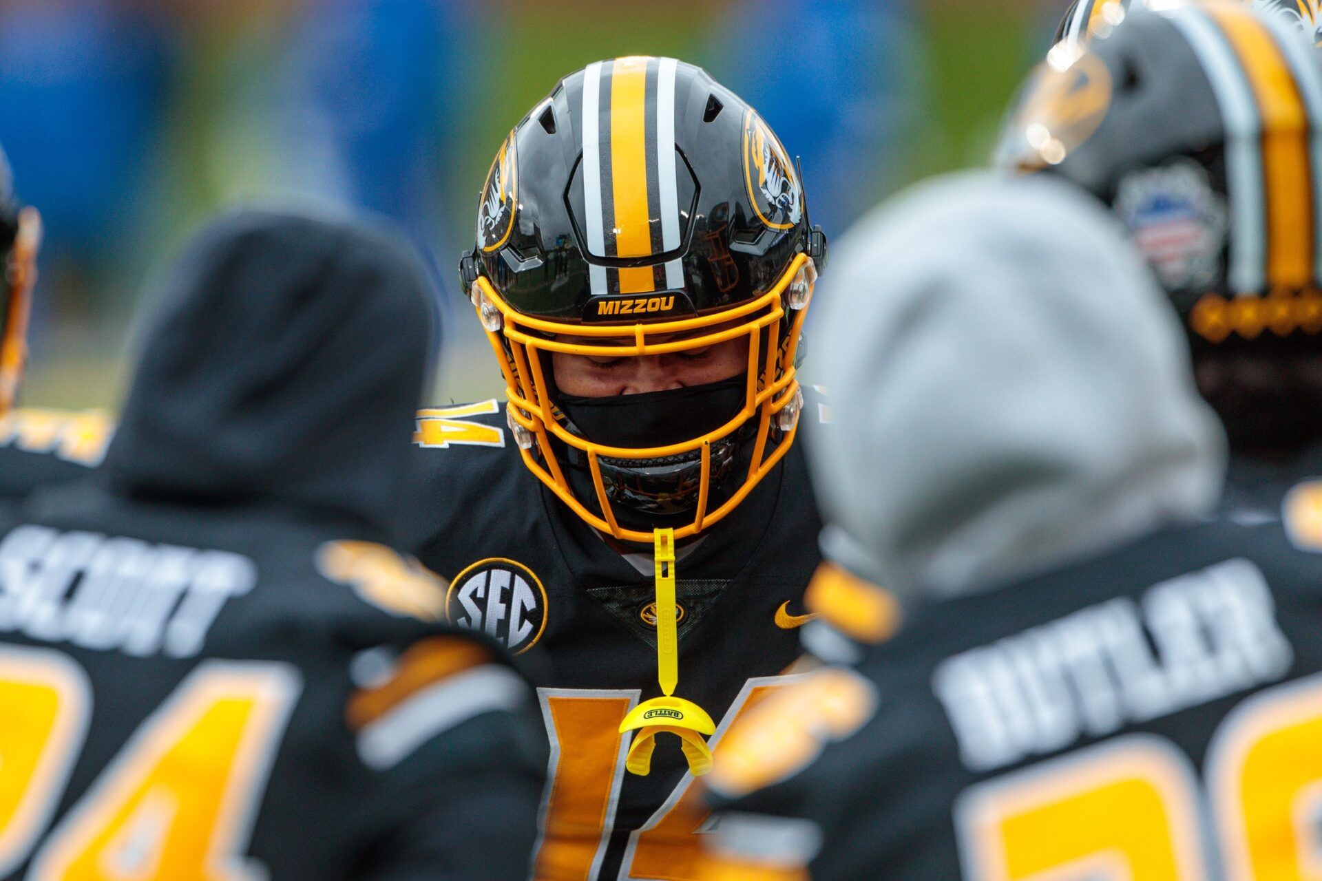 Kris Abrams-Draine (14) huddles with teammates prior to the game against the Kentucky Wildcats at Faurot Field at Memorial Stadium.