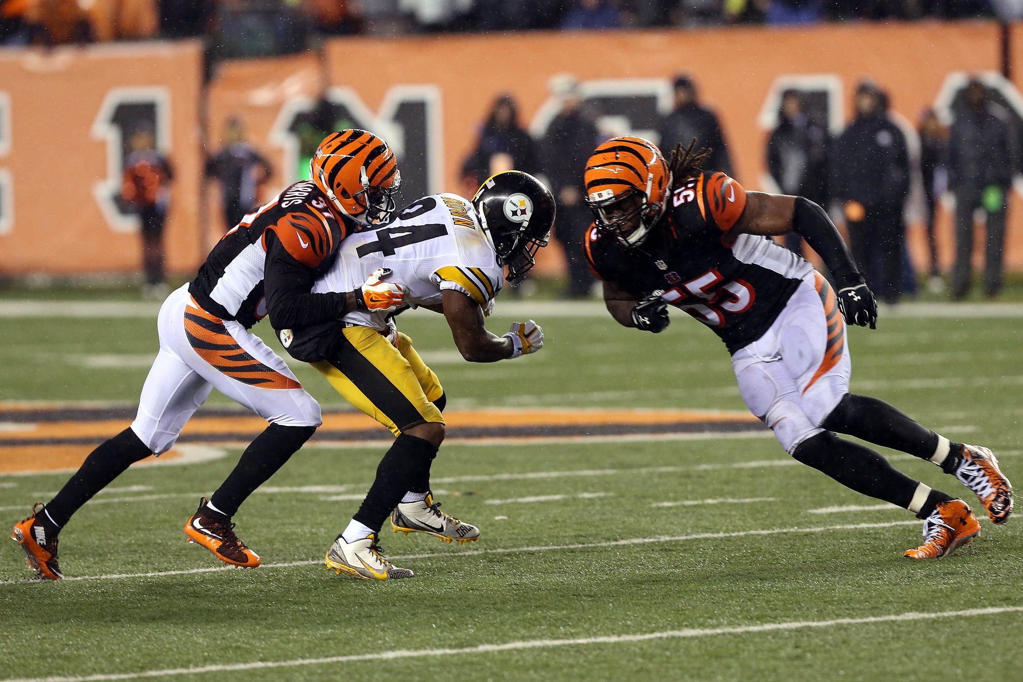 Vontaze Burfict (55) hits Pittsburgh Steelers wide receiver Antonio Brown (84) during the fourth quarter in the AFC Wild Card playoff football game at Paul Brown Stadium.