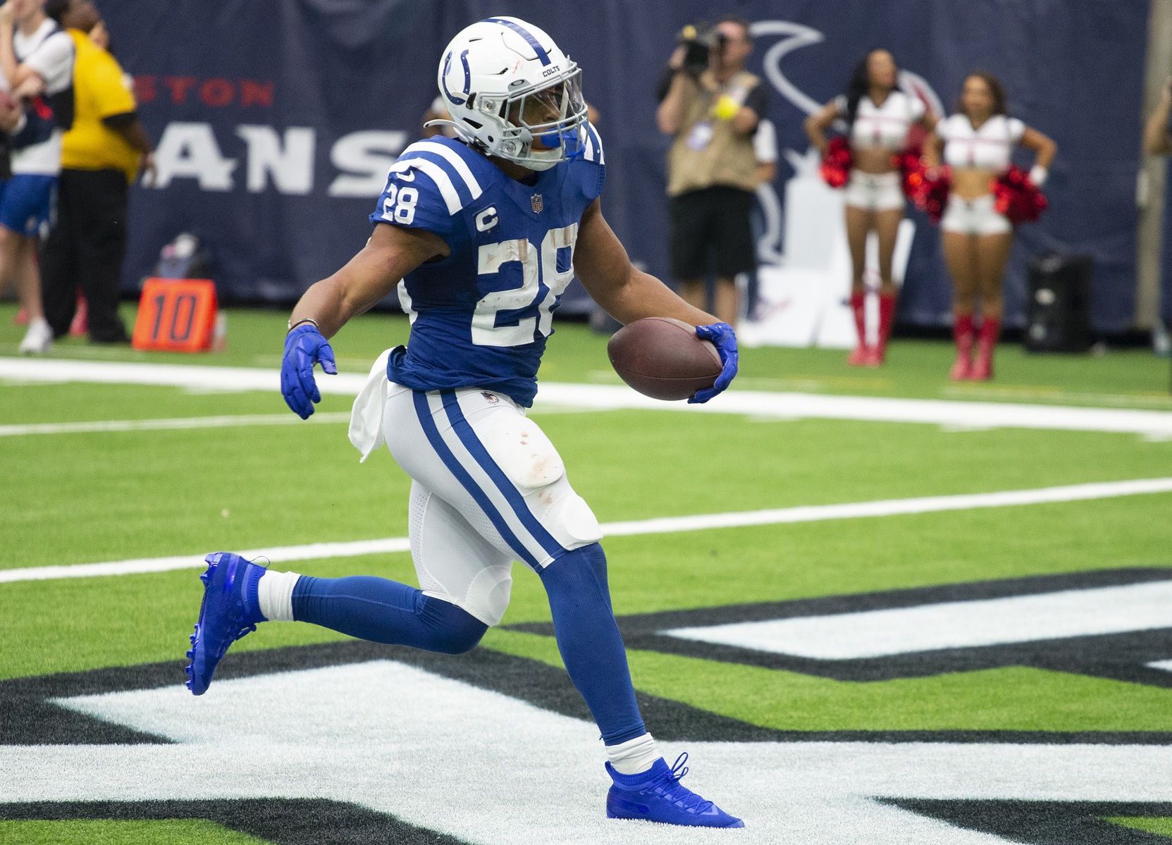 Jonathan Taylor (28) rushes for a touchdown against the Houston Texans in the fourth quarter at NRG Stadium.