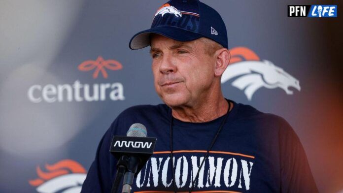 Sean Payton talks to the media at Broncos training camp.