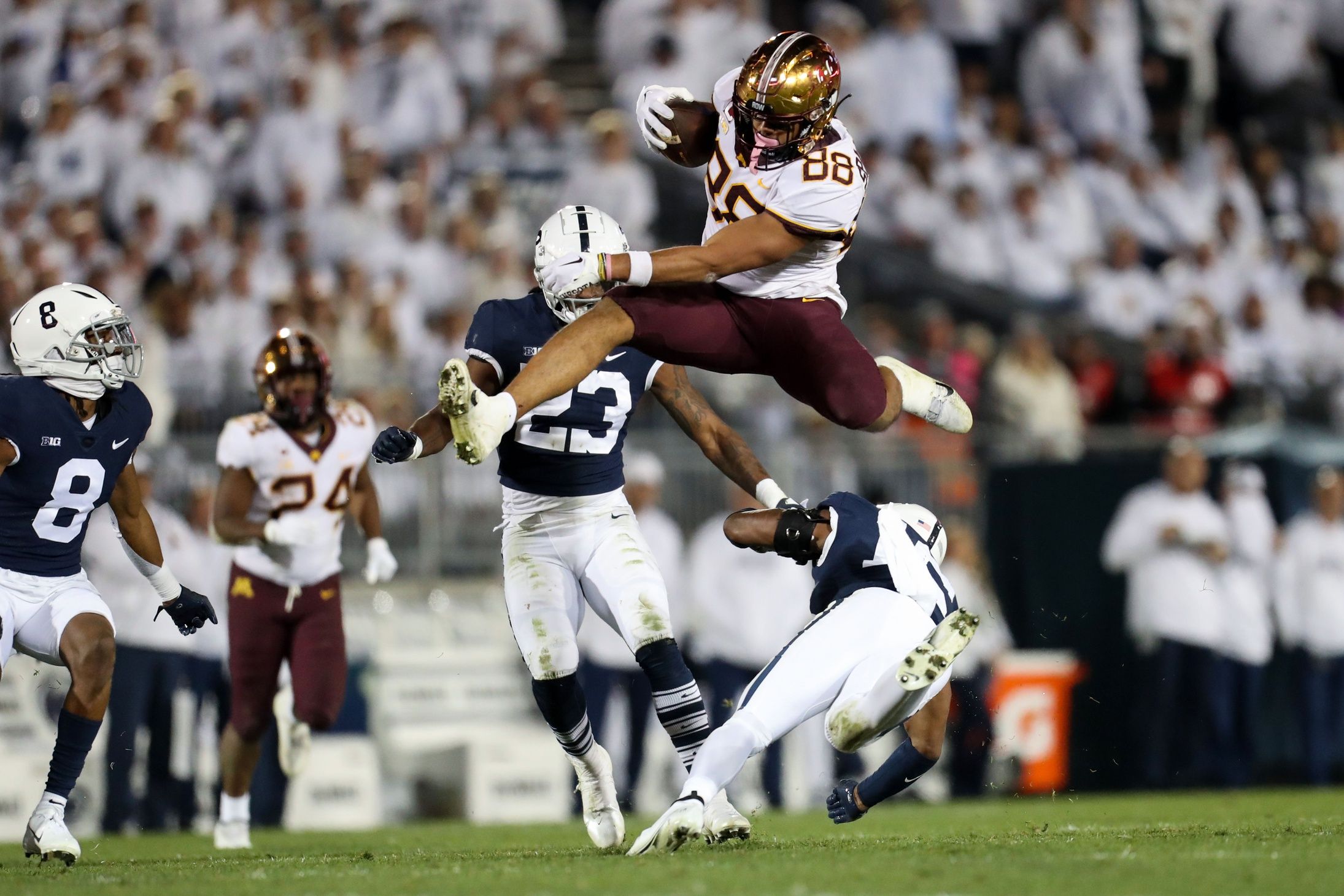 Brevyn Spann-Ford (88) jumps over Penn State Nittany Lions safety Ji'Ayir Brown (16) during the fourth quarter at Beaver Stadium.