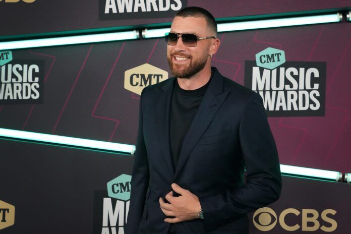 Kansas City Chiefs TE Travis Kelce arrives for the CMT Awards in Austin.