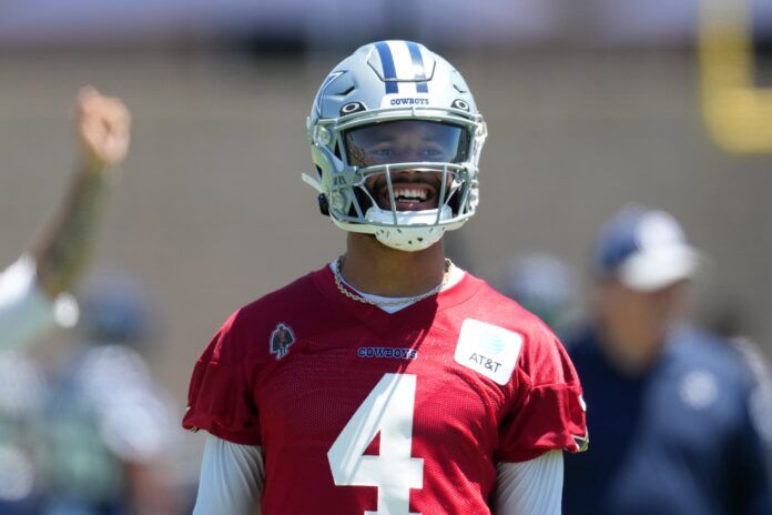 Dak Prescott (4) reacts during training camp at Marriott Residence Inn-River Ridge Playing Fields.