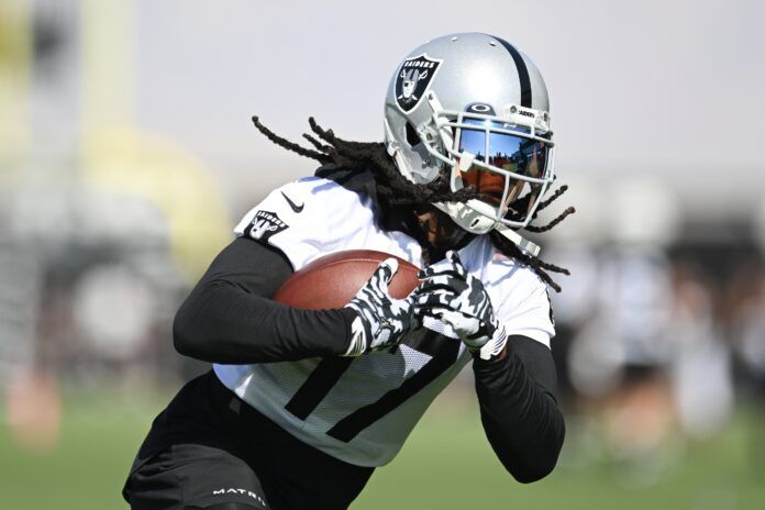 Davante Adams (17) runs a drill during training camp at the Intermountain Health Performance Center.