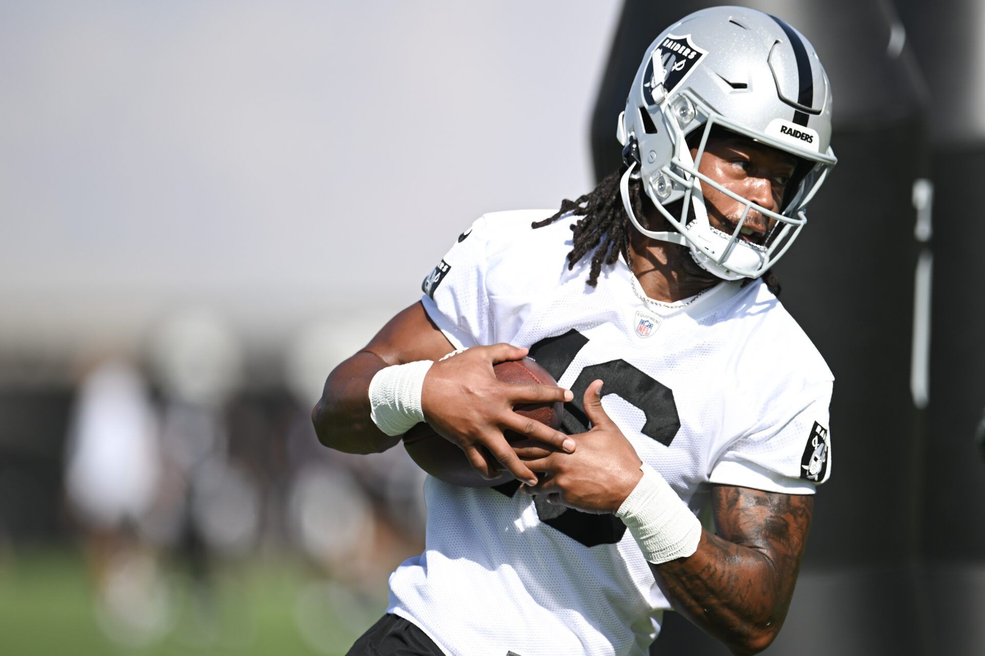 Jakobi Meyers (16) runs a drill during training camp at the Intermountain Health Performance Center.