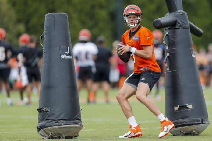 Cincinnati Bengals QB Joe Burrow (9) runs through drills during training camp.