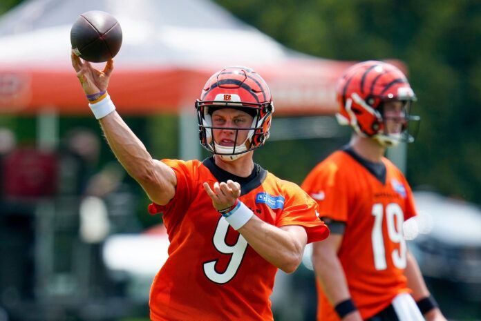 Joe Burrow (9) throws a pass during a training camp practice at the Paycor Stadium practice field.