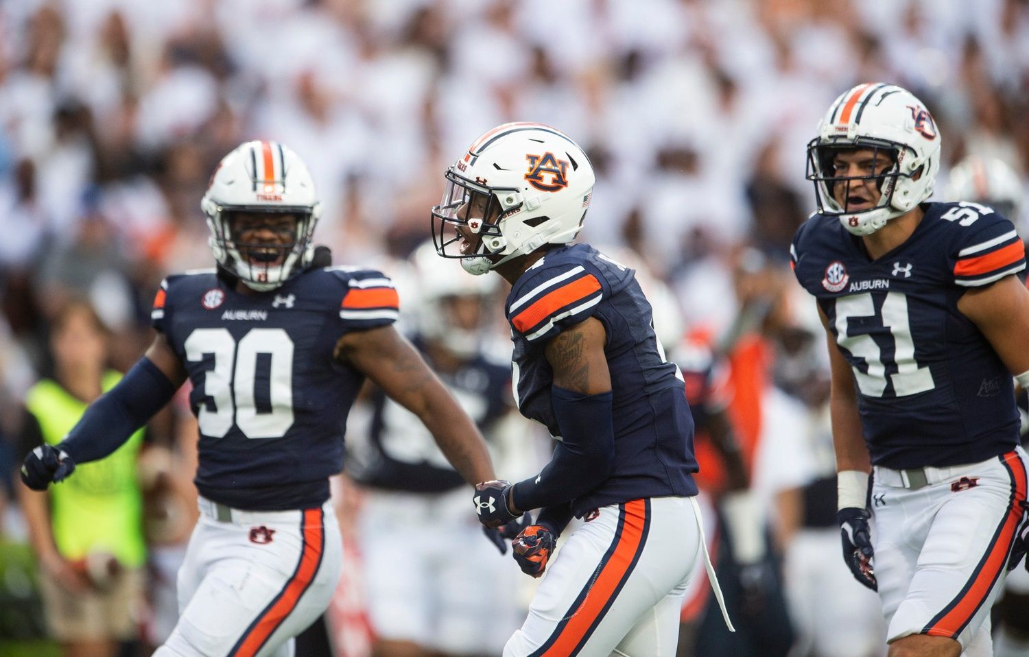 D.J. James (4) celebrates after making a stop in the backfield as Auburn Tigers take on Mercer Bears at Jordan-Hare Stadium.