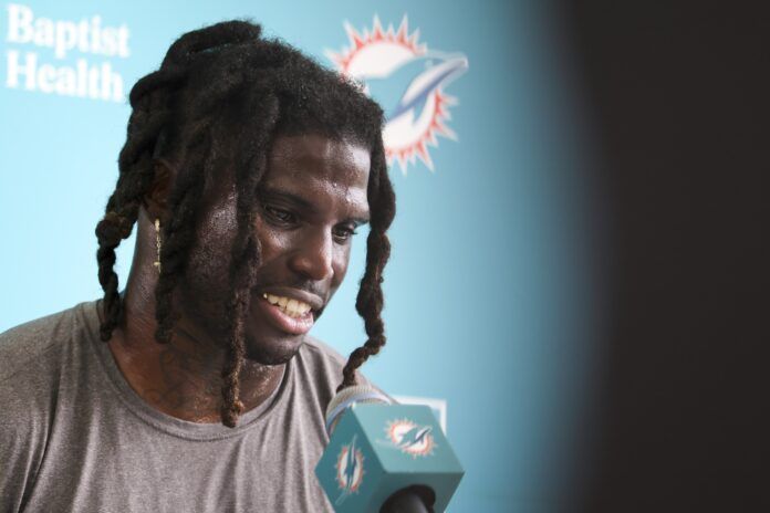 Miami Dolphins WR Tyreek Hill talks to the media during training camp.