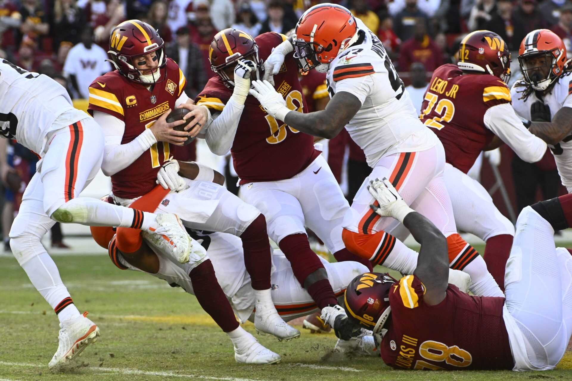 Cleveland Browns DE Myles Garrett (95) sacks Washington Commanders QB Carson Wentz (11).