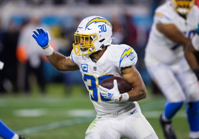 Austin Ekeler carries the football.