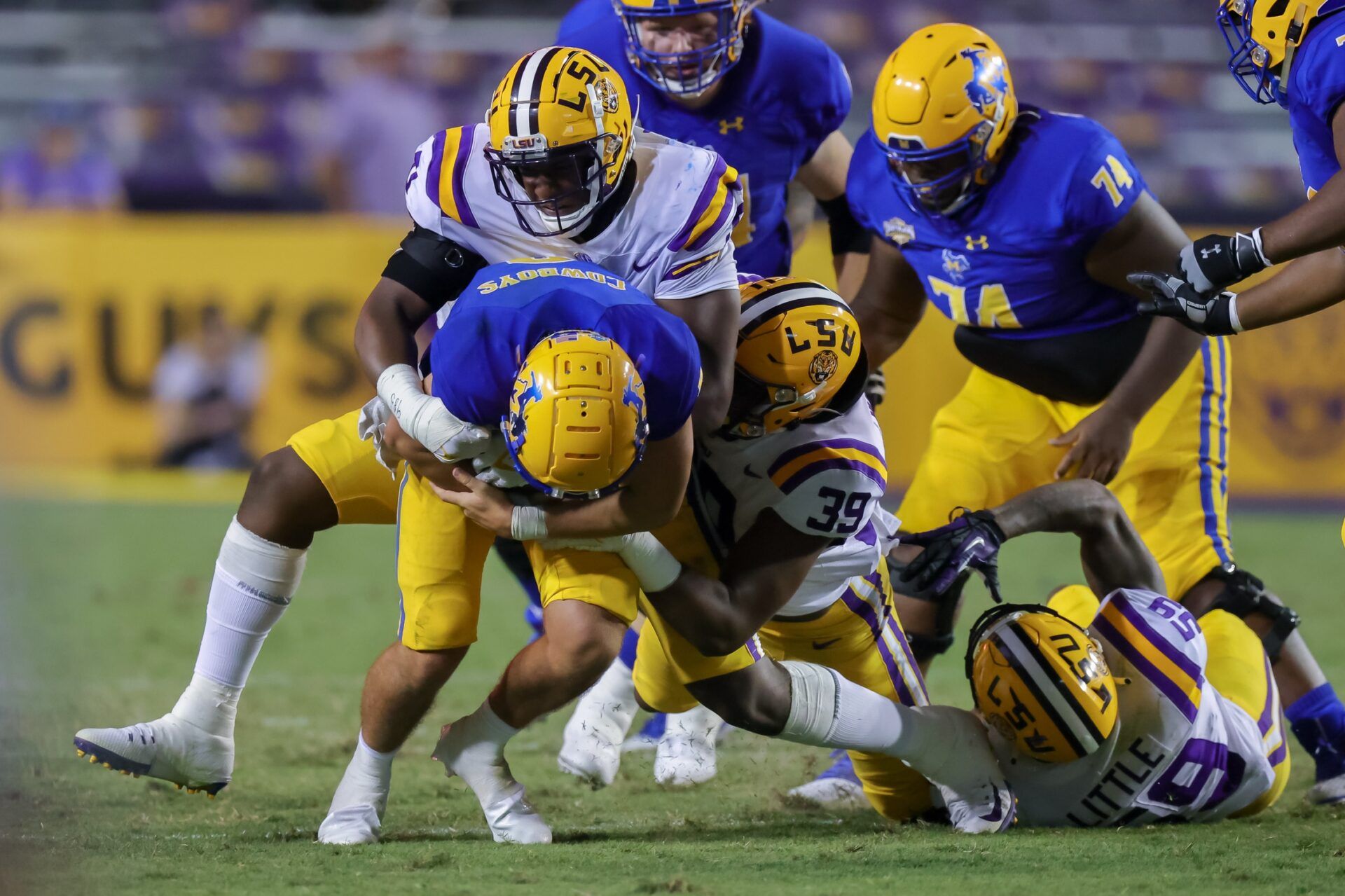 LSU Tigers DT Maason Smith (0) sacks McNeese State Cowboys QB Cody Orgeron (8).