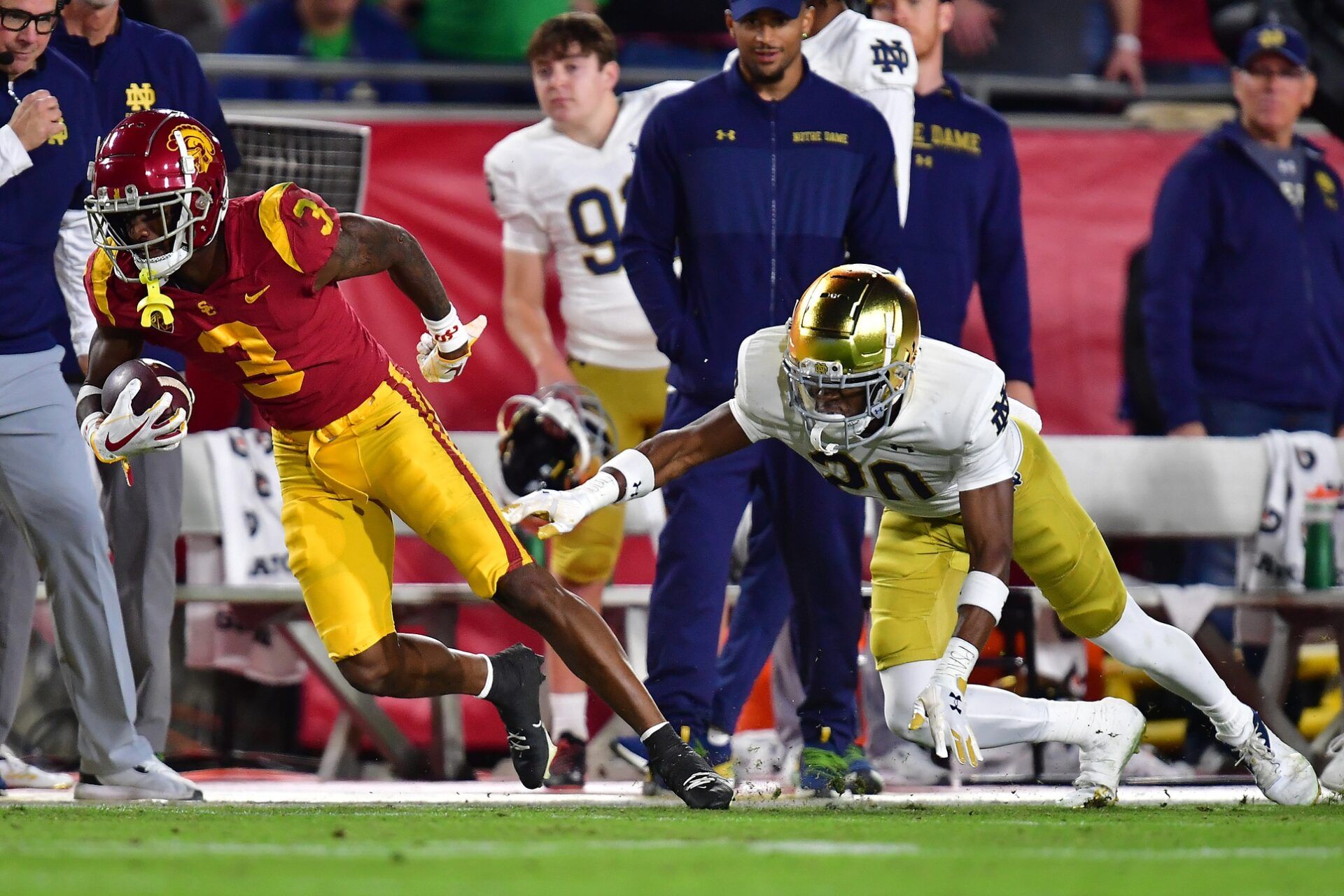 Wide receiver Jordan Addison (3) runs the ball after the catch against the Notre Dame Fighting Irish.