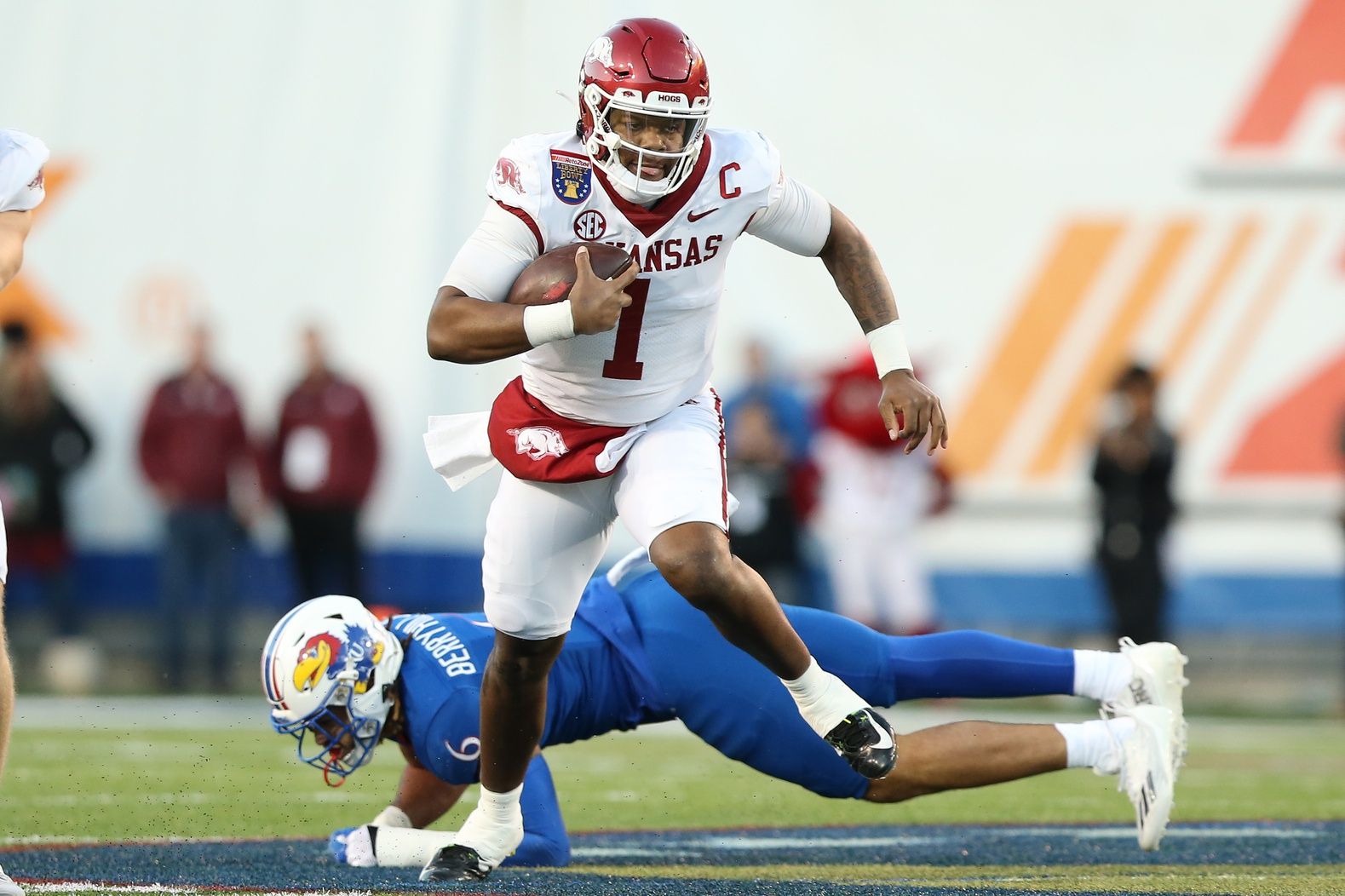 Arkansas Razorbacks QB KJ Jefferson (1) rushes the ball against the Kansas Jayhawks.