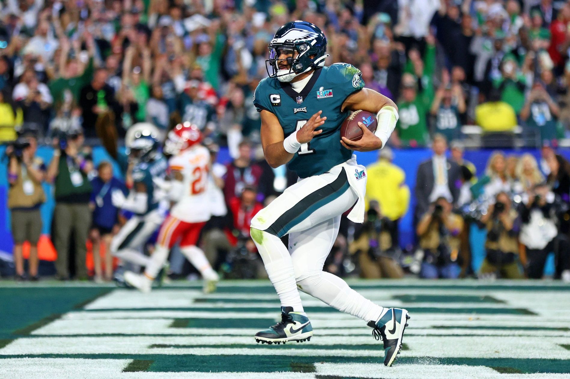 Philadelphia Eagles QB Jalen Hurts (1) runs in for a touchdown against the Kansas City Chiefs in Super Bowl LVII.