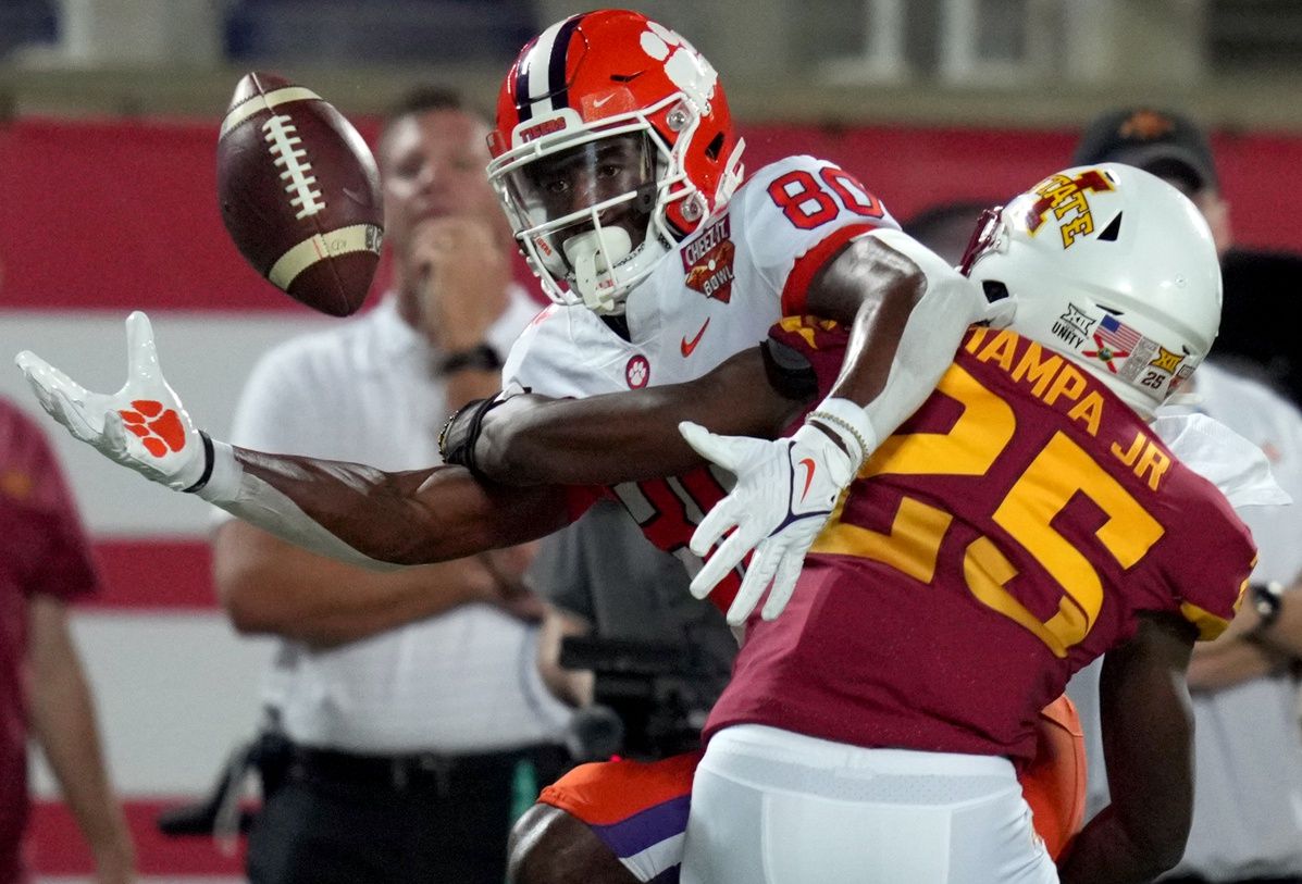 Iowa State Cyclones DB T.J. Tampa (25) breaks up a pass against the Clemson Tigers.