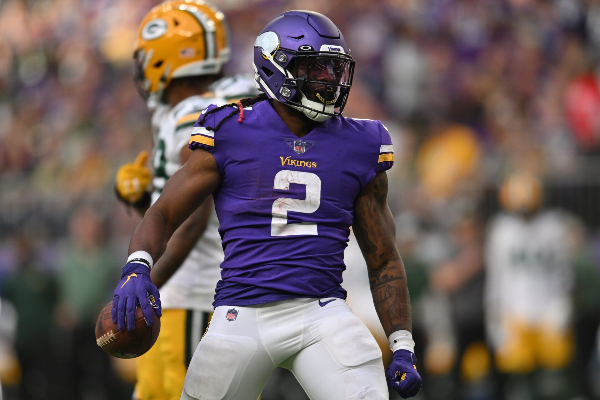 Minnesota Vikings RB Alexander Mattison (2) reacts after a play against the Green Bay Packers.