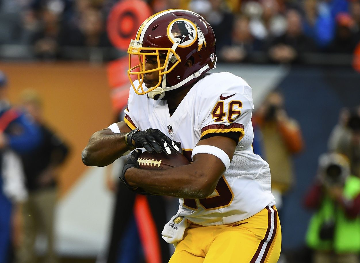 Alfred Morris (46) carries the ball against the Chicago Bears during the first quarter at Soldier Field.