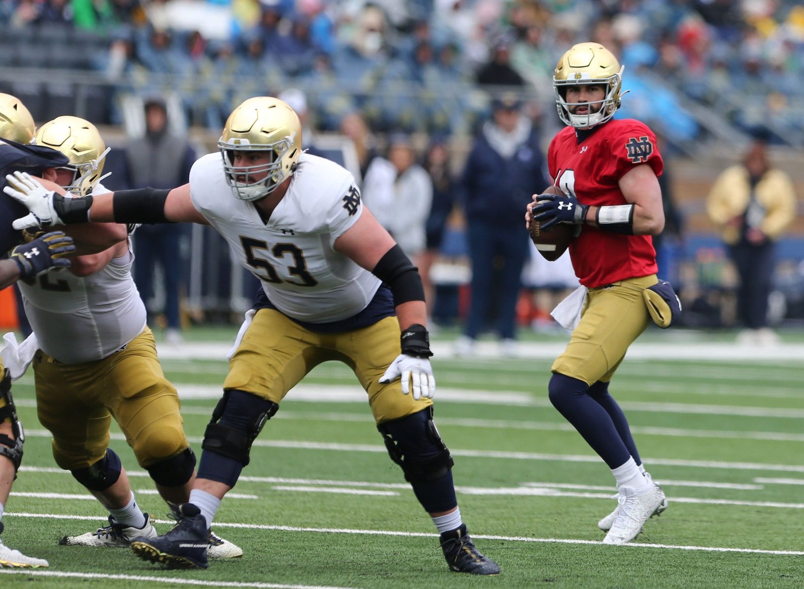 Sam Hartman (10) drops back to pass and is protected by offensive lineman Quinn Murphy (53) during the Notre Dame Blue-Gold Spring Football game.