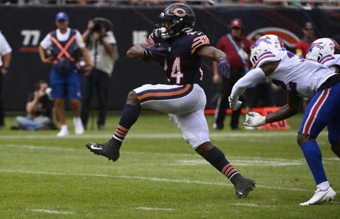 Chicago Bears RB Khalil Herbert (24) rushes the ball against the Buffalo Bills.