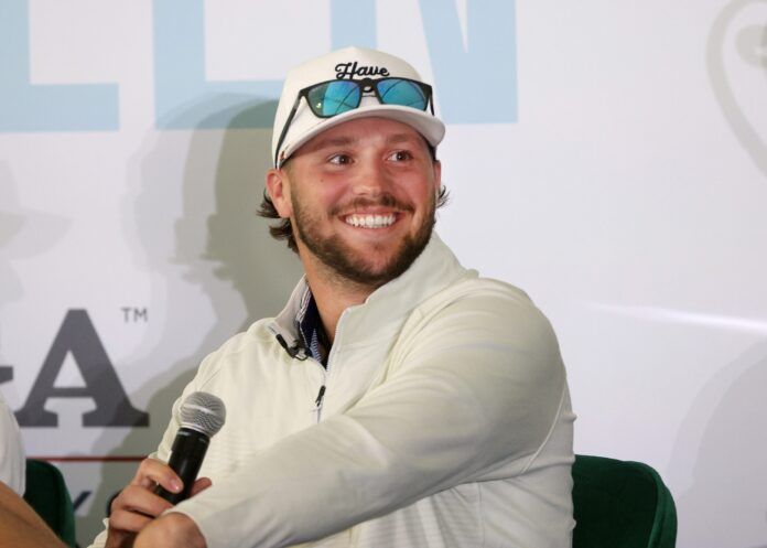 Josh Allen is greeted as he and other Buffalo players took part in a panel discussion with area students about building connections.