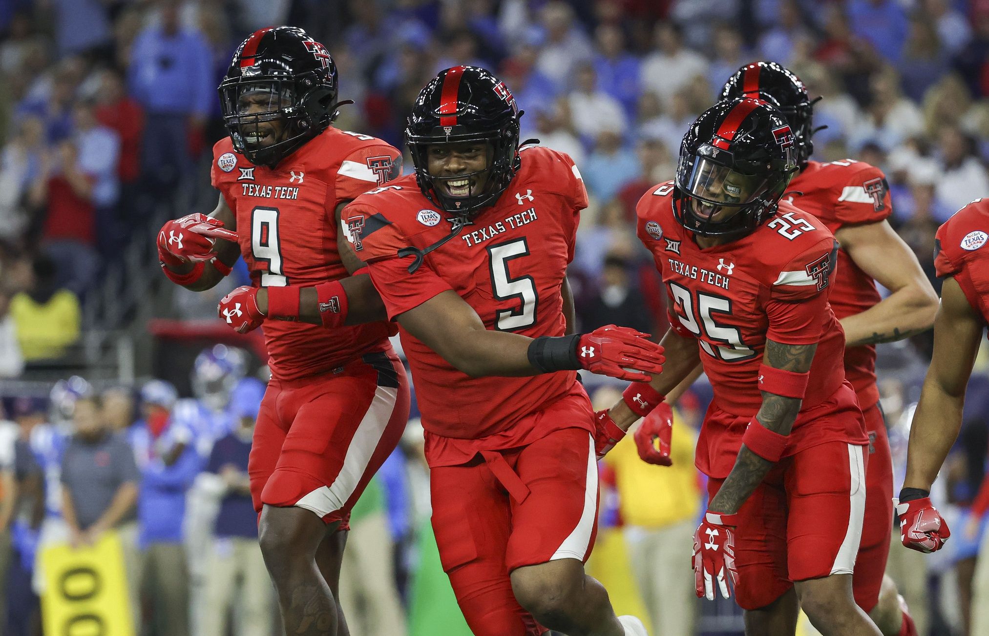 Myles Cole (5) reacts after a defensive play during the first quarter against the Mississippi Rebels in the 2022 Texas Bowl at NRG Stadium.