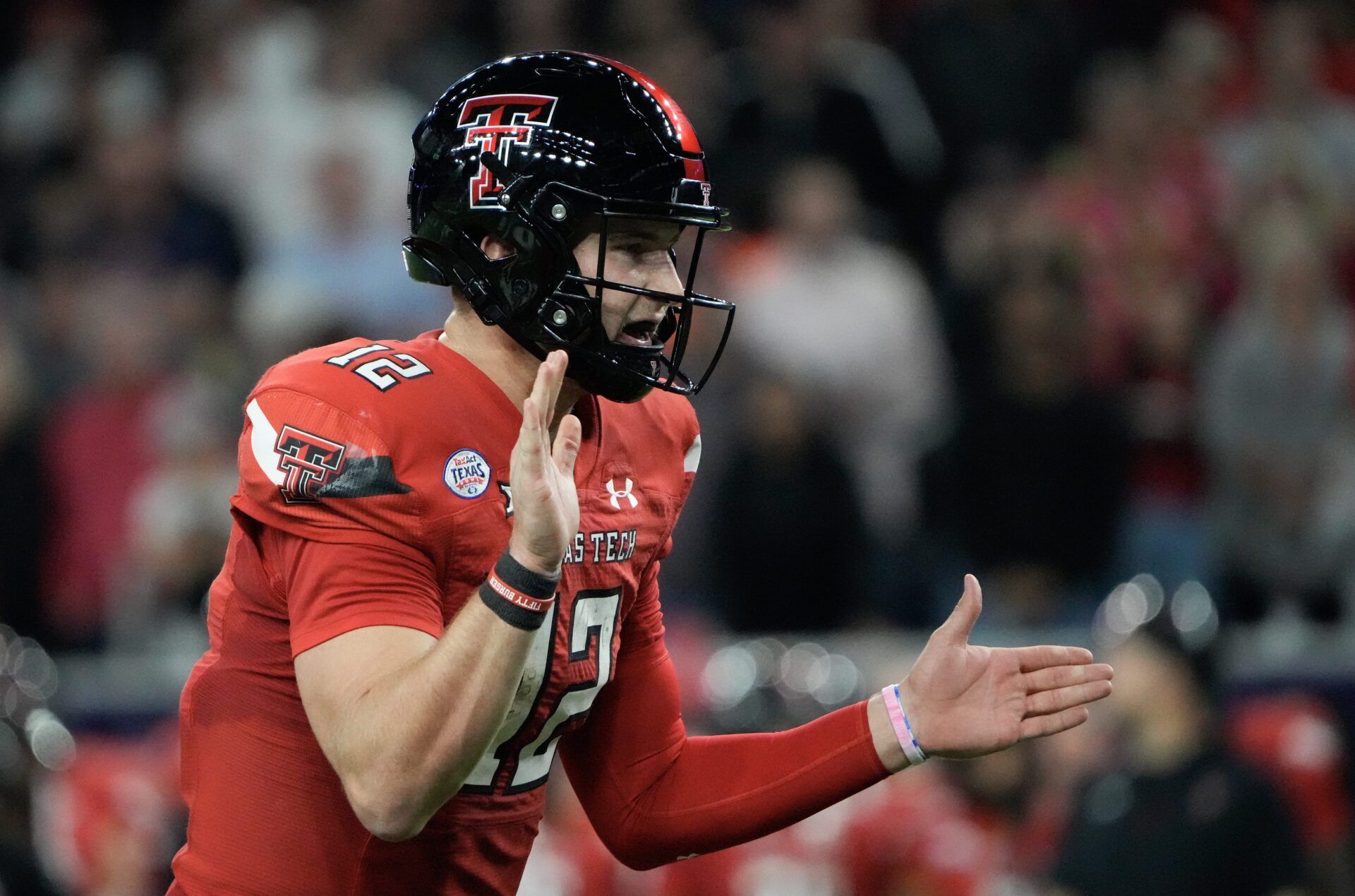 Tyler Shough (12) under center against the Mississippi Rebels in the first half in the 2022 Texas Bowl at NRG Stadium.