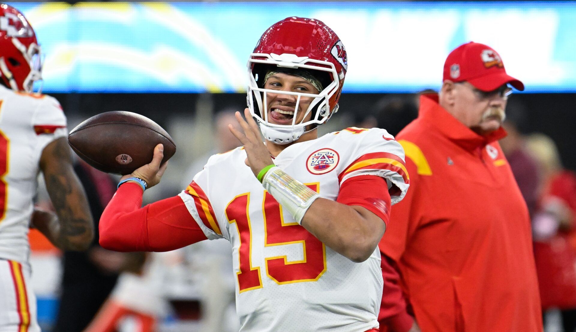 Patrick Mahomes (15) and head coach Andy Reid during pregame warmups before an NFL game against the Los Angeles Chargers at SoFi Stadium.