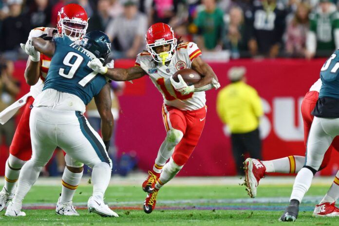 Isiah Pacheco (10) runs with the ball against the Philadelphia Eagles during the fourth quarter of Super Bowl LVII at State Farm Stadium.