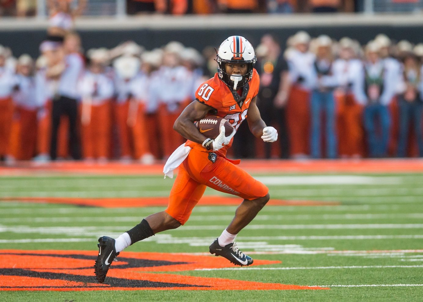Brennan Presley (80) runs after a catch for a big gain during the second quarter against the Central Michigan Chippewas at Boone Pickens Stadium.