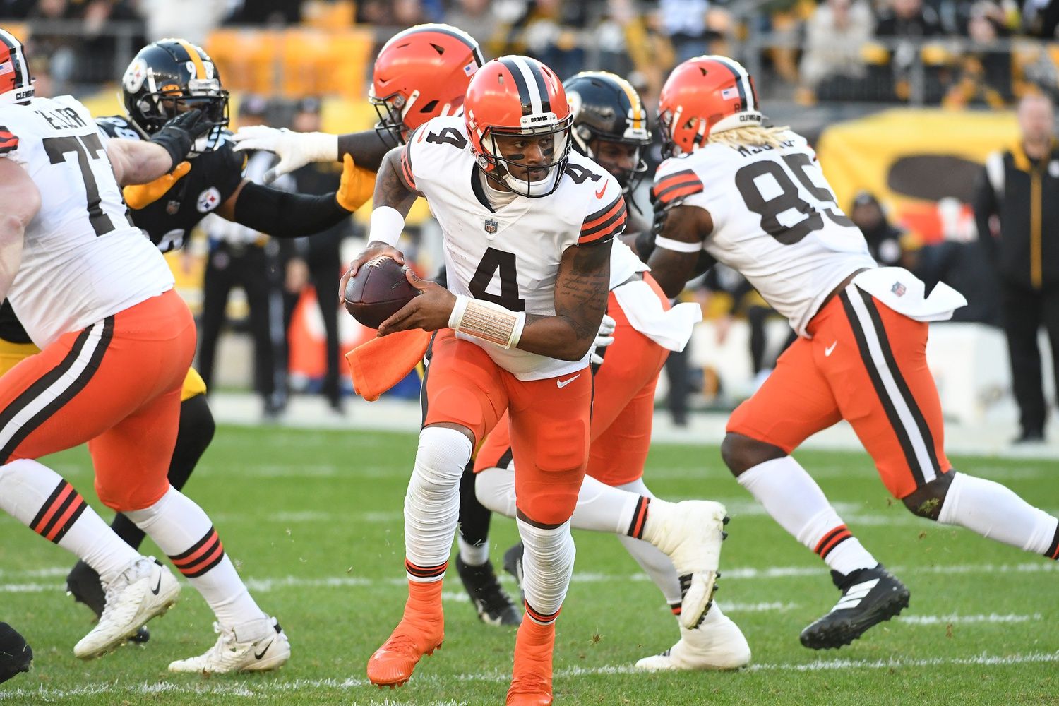 Deshaun Watson (4) scrambles with the ball while playing the Pittsburgh Steelers in the third quarter at Acrisure Stadium.