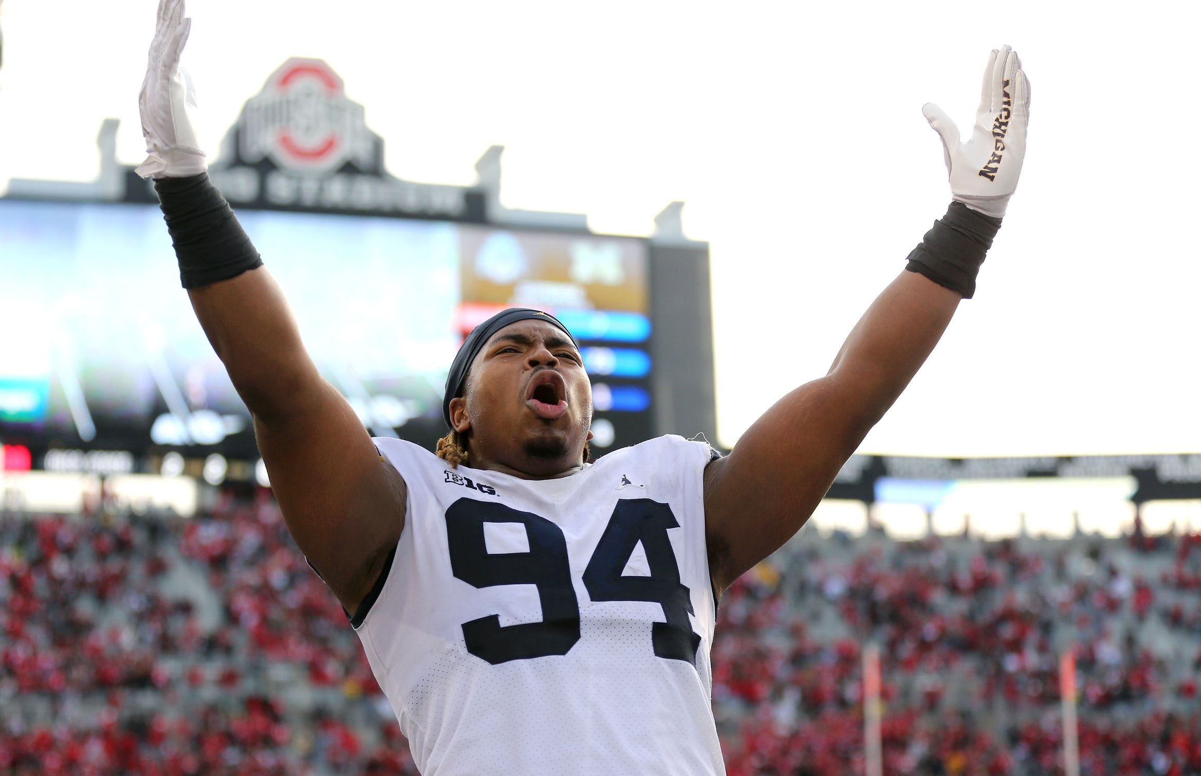 Kris Jenkins (94) celebrates as time winds down in the win against the Ohio State Buckeyes at Ohio Stadium.