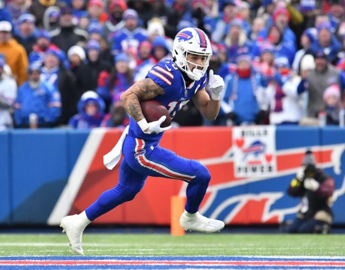 Khalil Shakir (10) runs with the ball after a catch against the New England Patriots in the third quarter at Highmark Stadium.