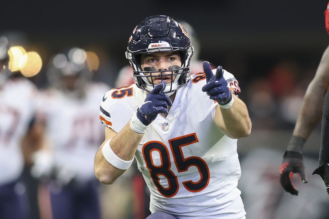 Cole Kmet (85) reacts after a catch against the Atlanta Falcons in the second quarter at Mercedes-Benz Stadium.