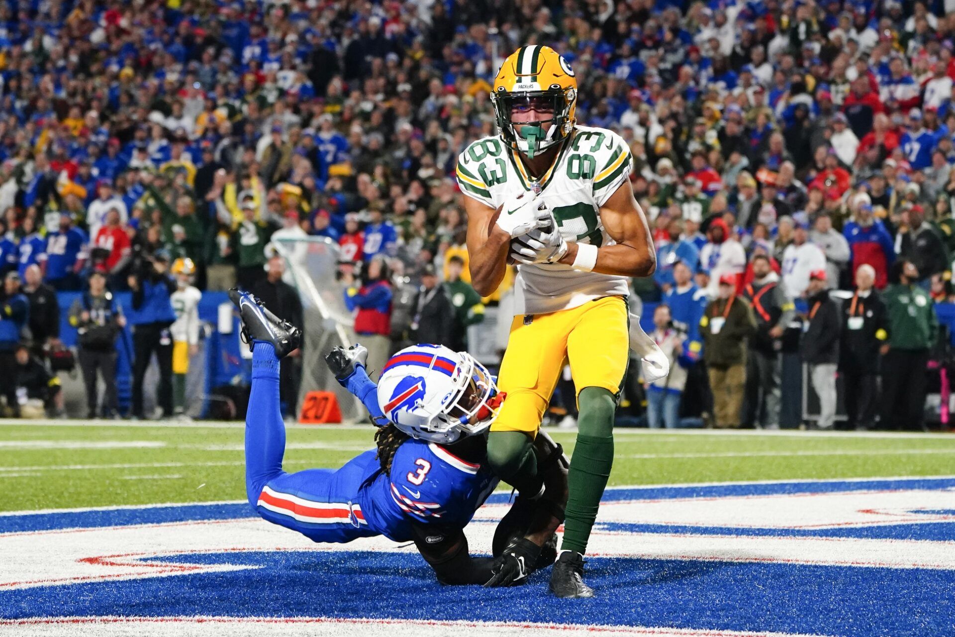 Green Bay Packers WR Samori Toure (83) hauls in a TD pass against the Buffalo Bills.