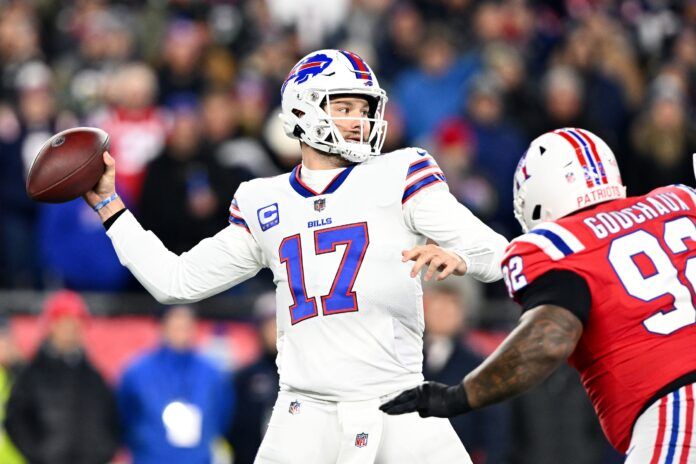 Buffalo Bills QB Josh Allen (17) throws a pass against the New England Patriots.