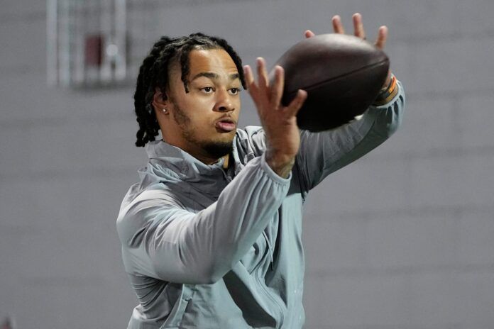 Ohio State Buckeyes wide receiver Jaxon Smith-Njigba catches a pass during Ohio State's Pro Day.