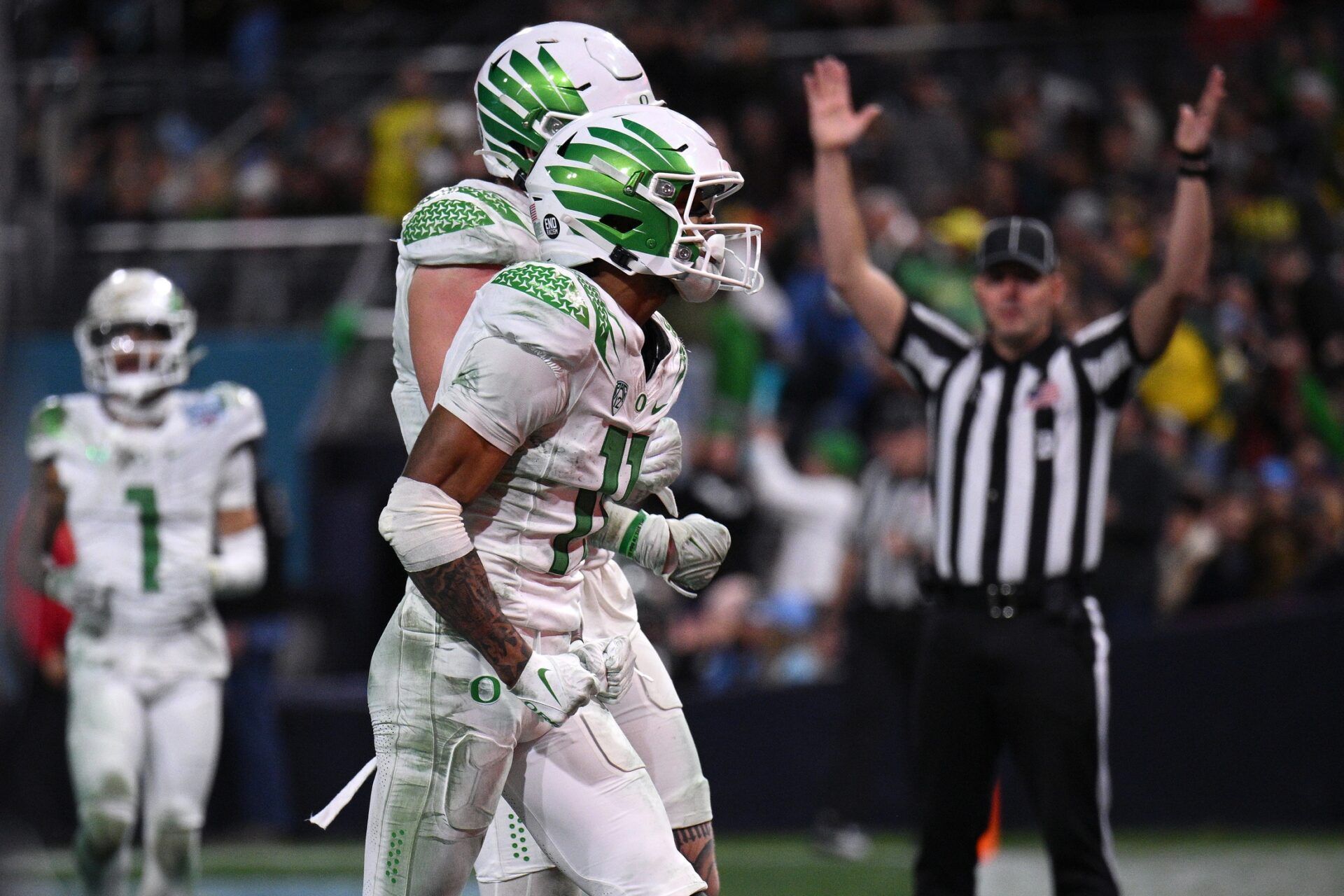 Oregon Ducks wide receiver Troy Franklin (11) celebrates after scoring a touchdown against the North Carolina Tar Heels during the second half of the 2022 Holiday Bowl at Petco Park.