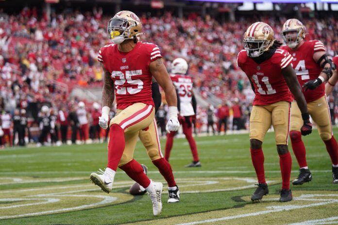 San Francisco 49ers RB Elijah Mitchell (25) celebrates after a touchdown against the Arizona Cardinals.