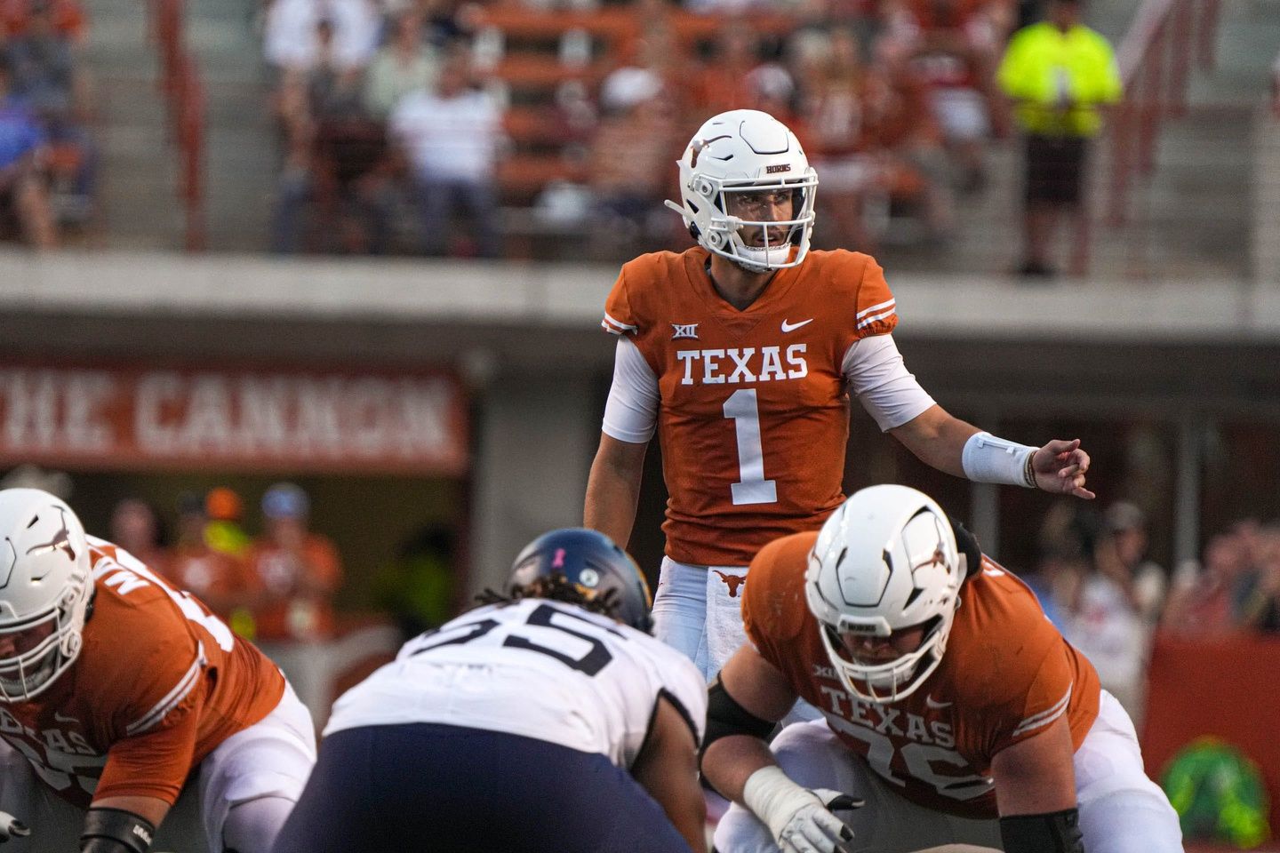 Texas quarterback Hudson Card (1) directs the Longhorns offense during the game against West Virginia at Royal Memorial Stadium in Austin, Texas on Oct. 1, 2022.