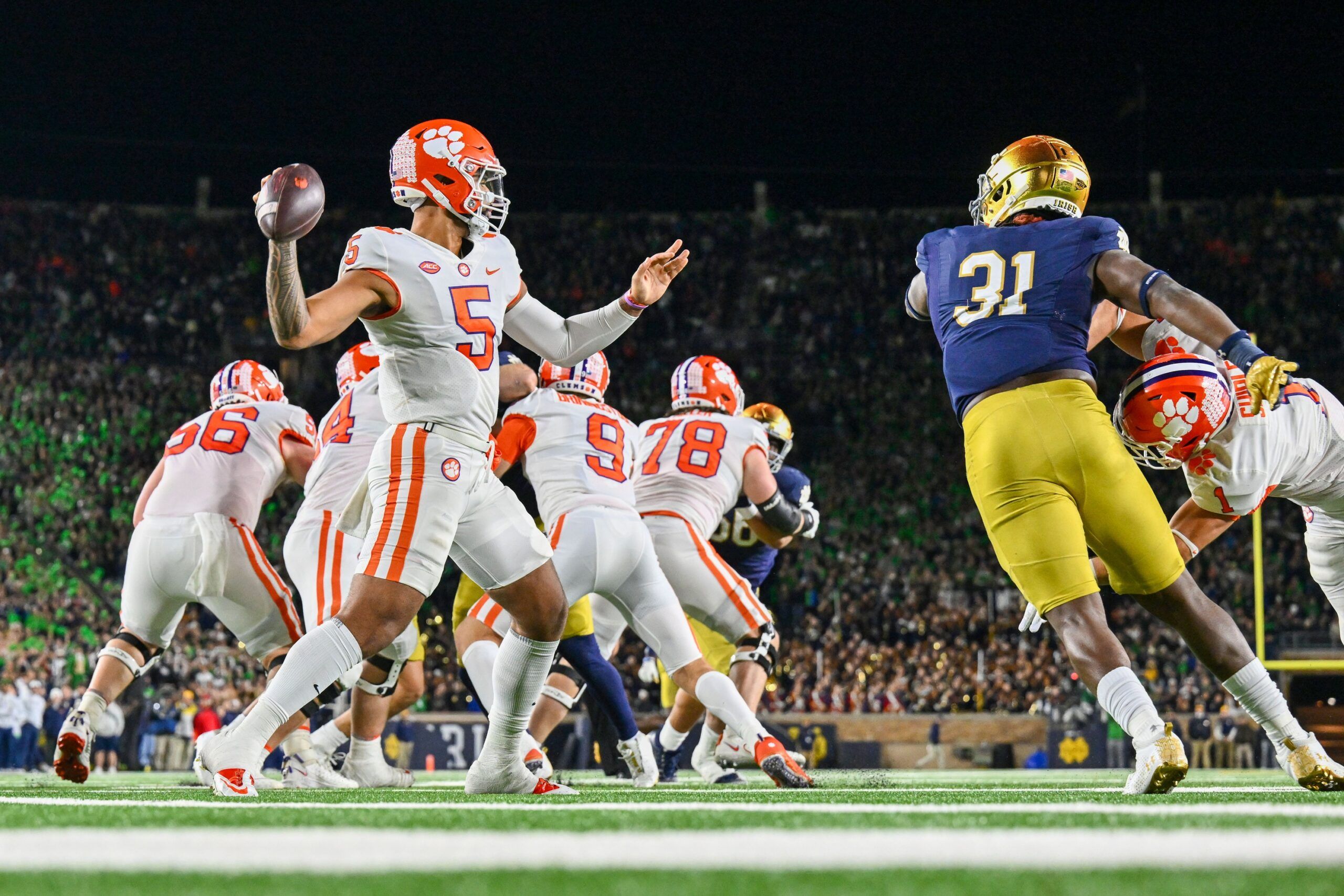 Clemson Tigers quarterback DJ Uiagalelei (5) throws against the Notre Dame Fighting Irish in the third quarter at Notre Dame Stadium. 