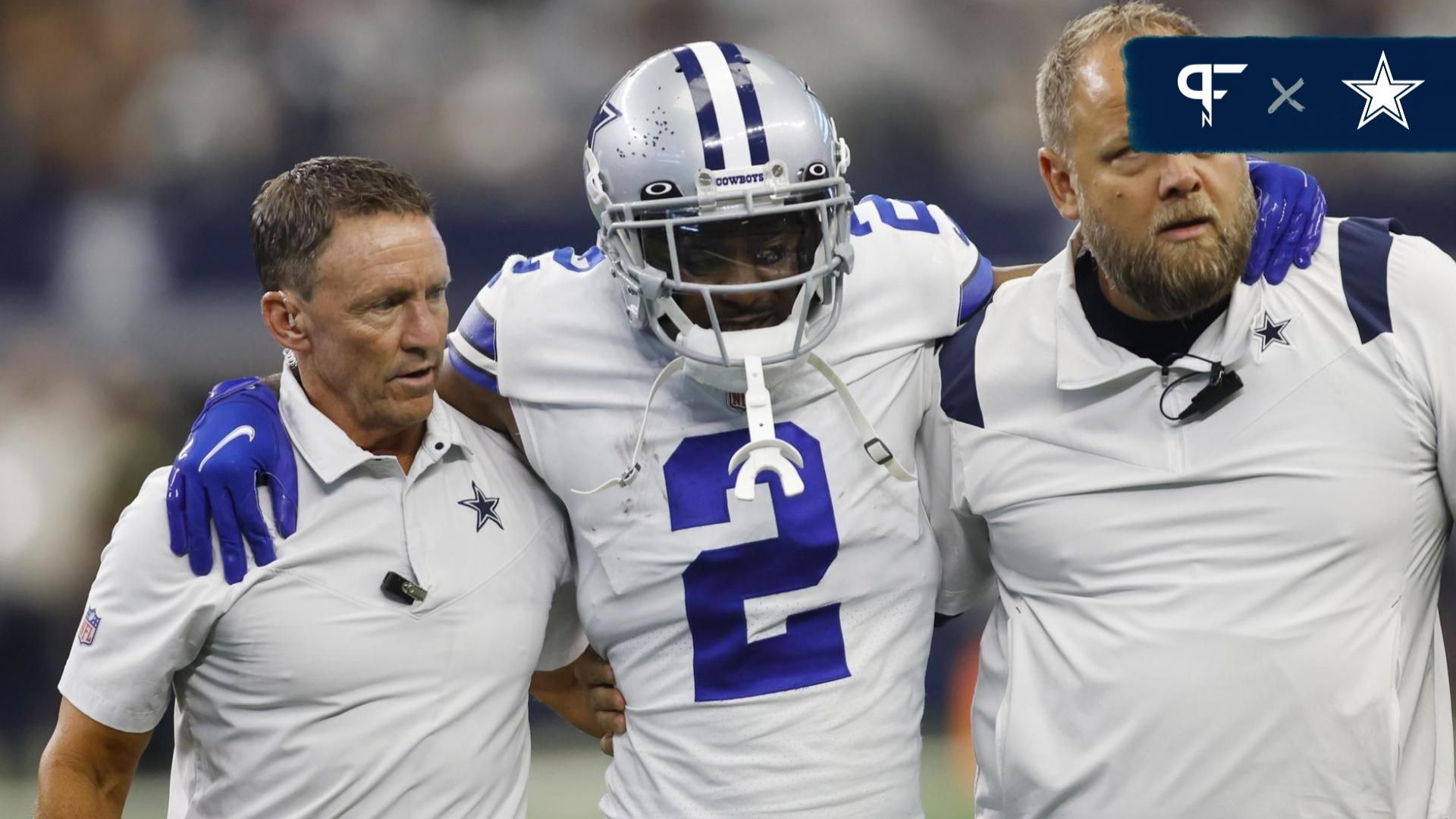 Dallas Cowboys cornerback Jourdan Lewis (2) is helped off the field by medical staff members in the fourth quarter against the Detroit Lions at AT&T Stadium.