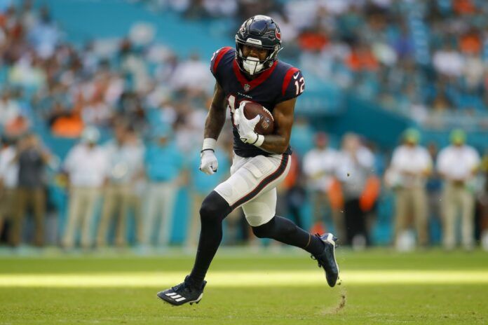 Houston Texans wide receiver Nico Collins (12) runs with the football during the fourth quarter against the Miami Dolphins at Hard Rock Stadium.