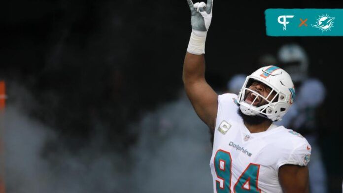 Miami Dolphins DT Christian Wilkins (94) coming out of the tunnel.