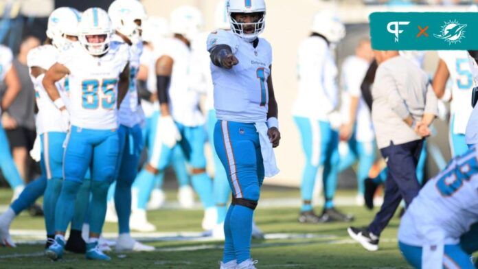 Miami Dolphins QB Tua Tagovailoa (1) giving direction in warmups.