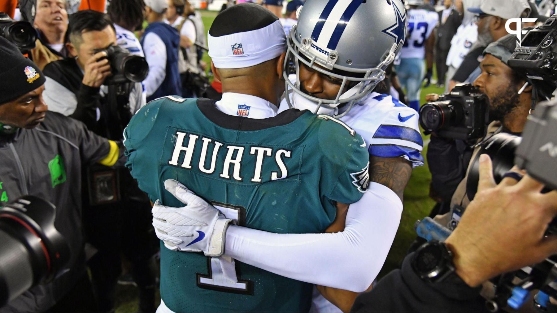 Philadelphia Eagles QB Jalen Hurts (1) and Dallas Cowboys DB Trevon Diggs (7) hug after a game.