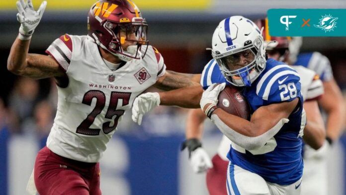 Indianapolis Colts RB Jonathan Taylor (28) rushes the ball against the Washington Commanders.