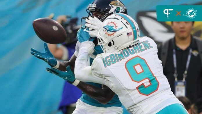 Jacksonville Jaguars wide receiver Calvin Ridley (0) makes a catch defended by Miami Dolphins cornerback Noah Igbinoghene (9).